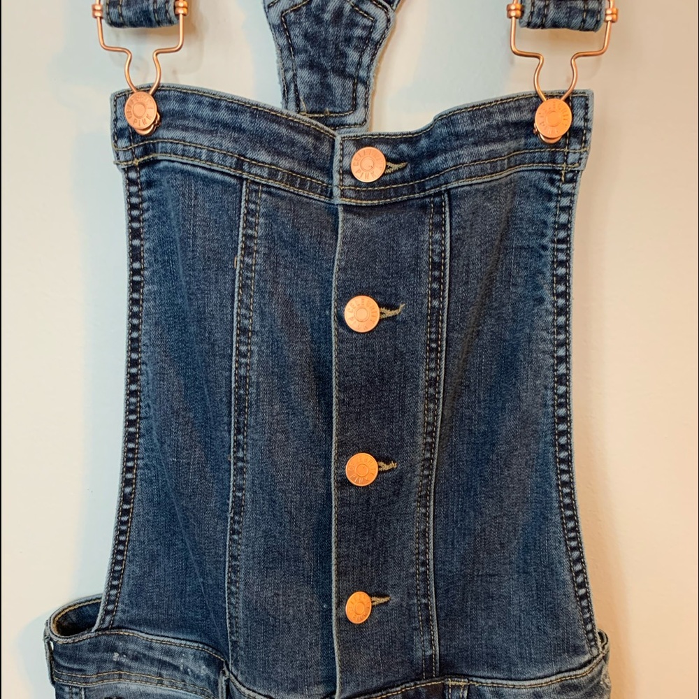 Celebrity Pink Distressed Denim overalls